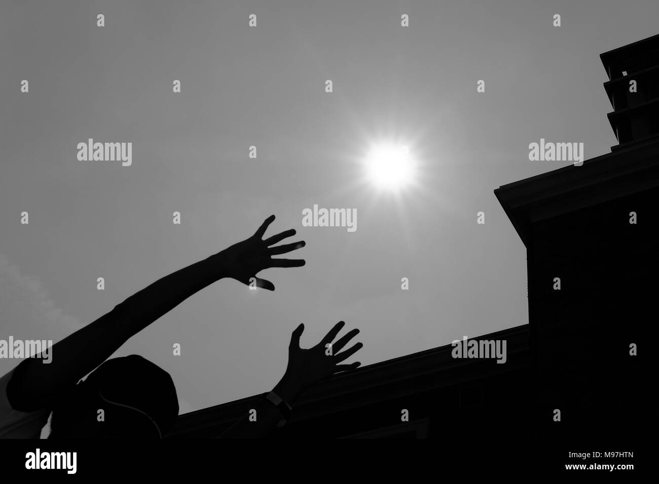 Woman reaching out her hand Black and White Stock Photos & Images - Alamy