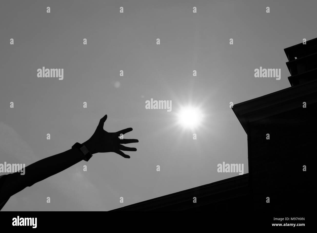 Woman reaching out her hand Black and White Stock Photos & Images - Alamy