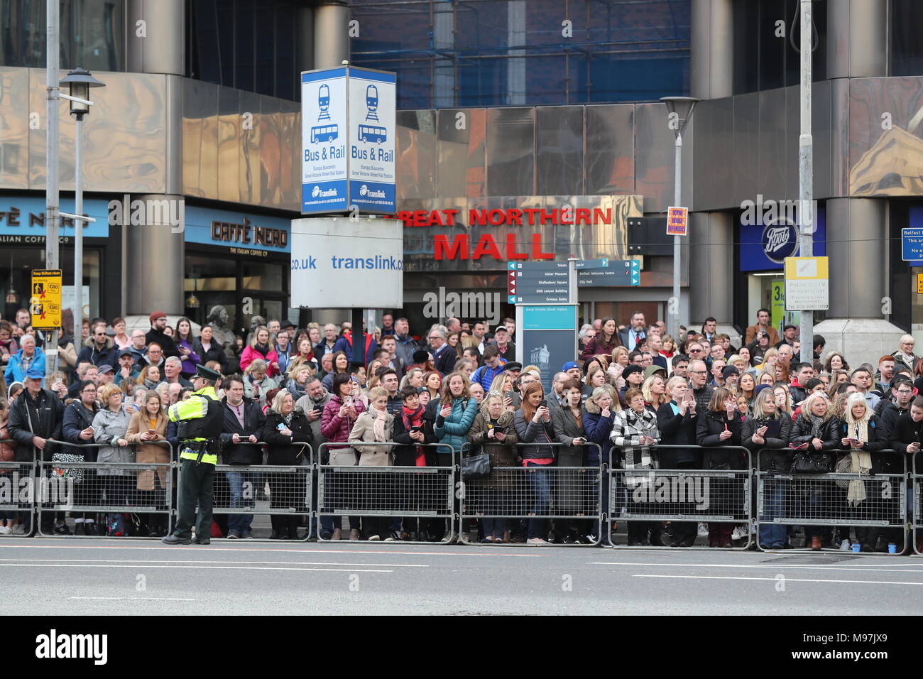 Crowds wait to greet Prince Harry and Meghan Markle following their visit to the Crown Bar in Belfast City Centre, where they learnt from National Trust representatives about the pub's heritage, and met bar staff, local comedians and musicians. Stock Photo