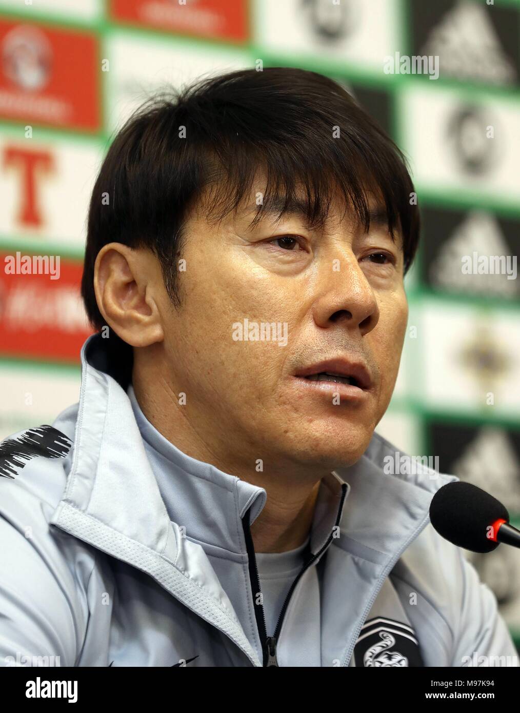 South Korea's head coach Shin Tae-yong (right) during the press conference at Windsor Park, Belfast. Stock Photo