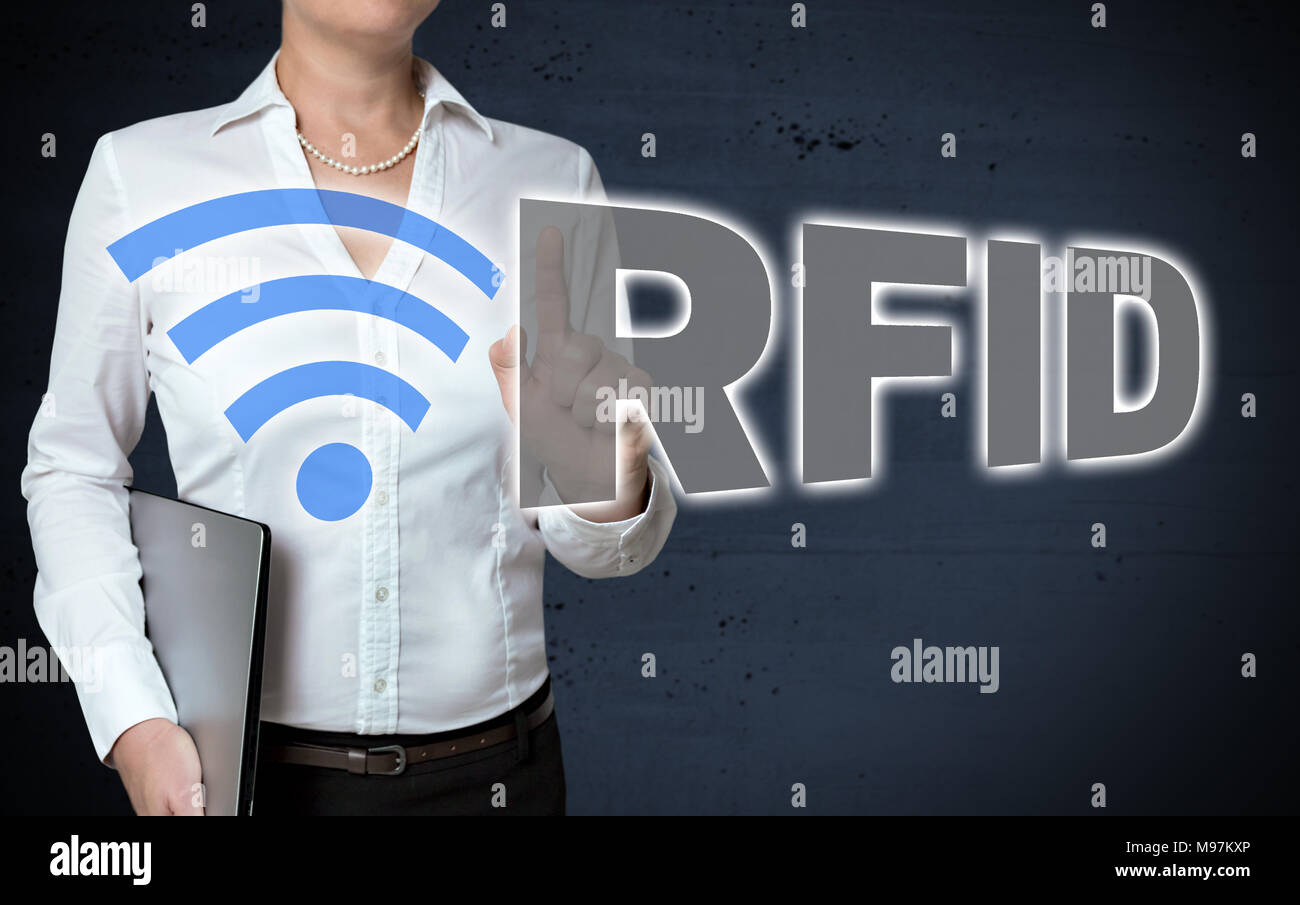 RFID touchscreen is shown by businesswoman. Stock Photo