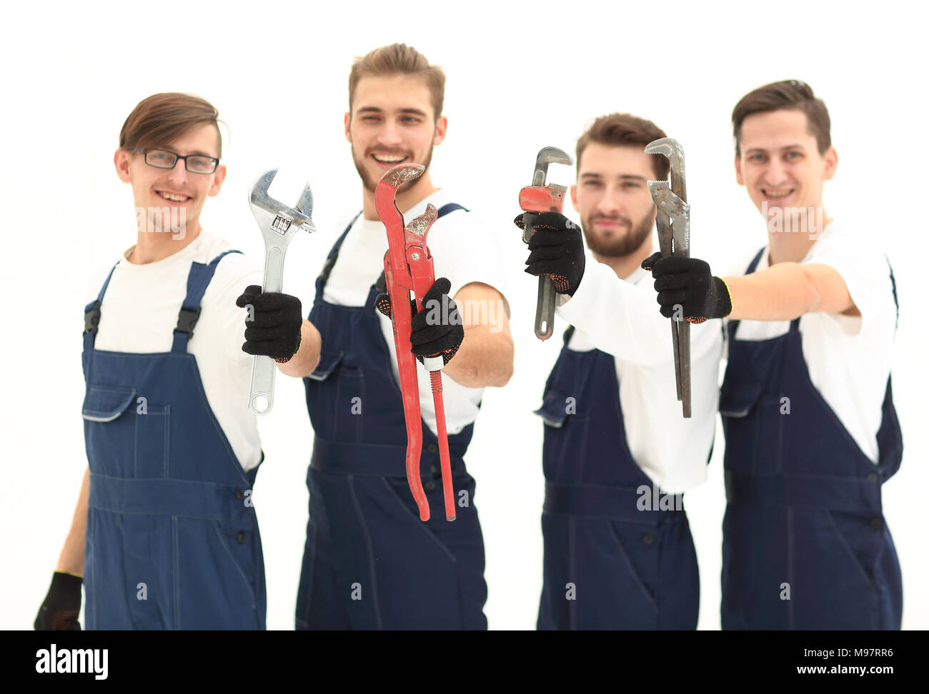 group of construction workers with working tools Stock Photo - Alamy