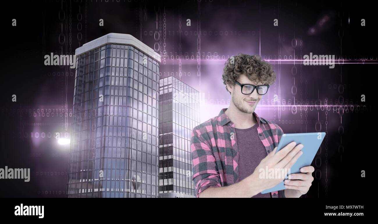 Man using tablet with Tall buildings with dark binary code flares Stock Photo