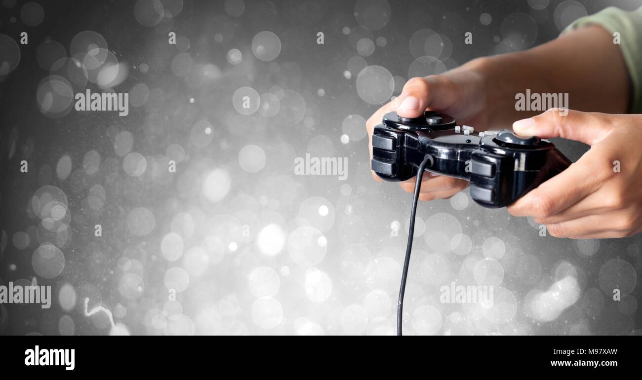 Hands holding gaming controller Stock Photo Alamy