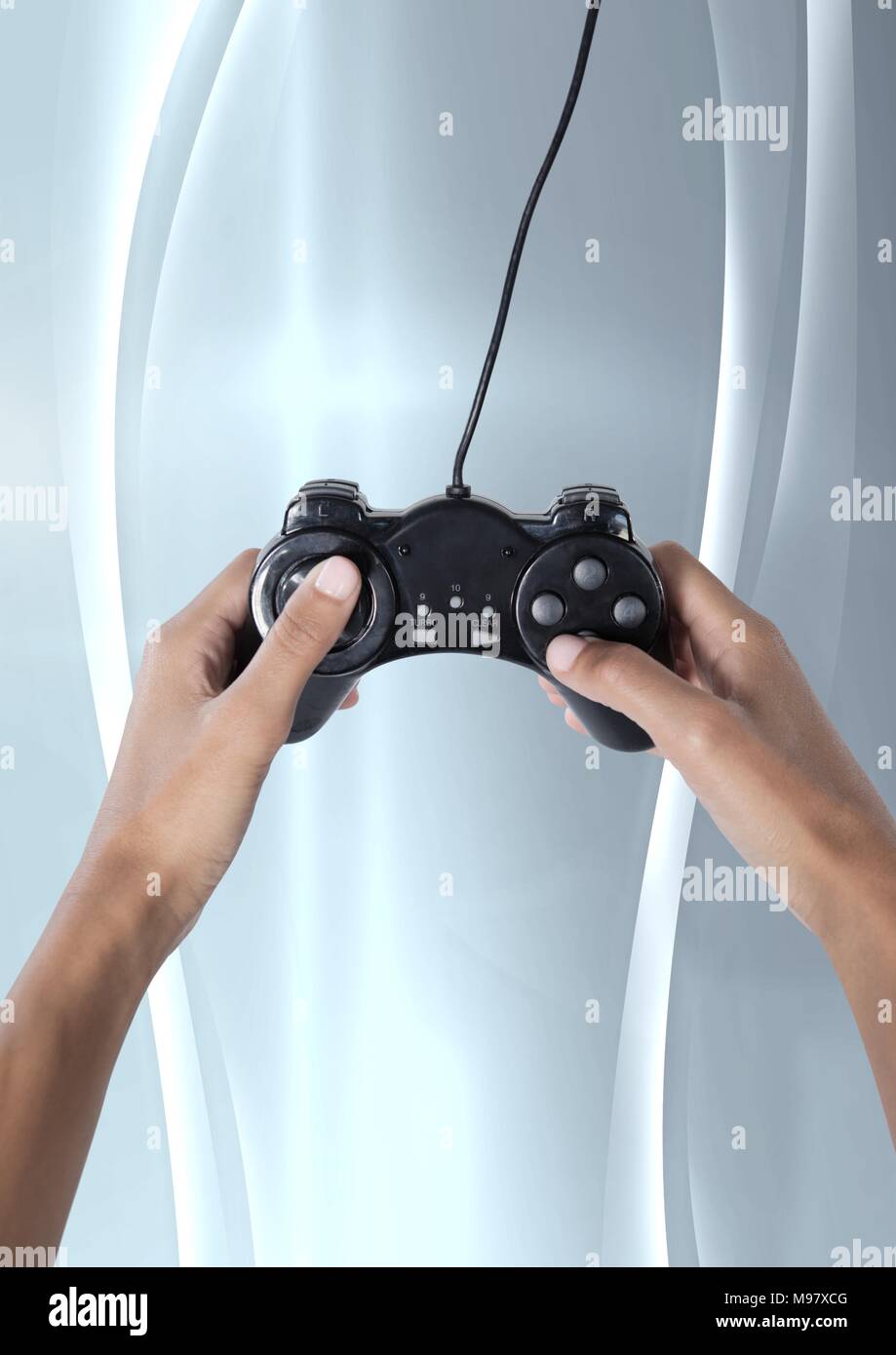 Hands holding gaming controller Stock Photo Alamy