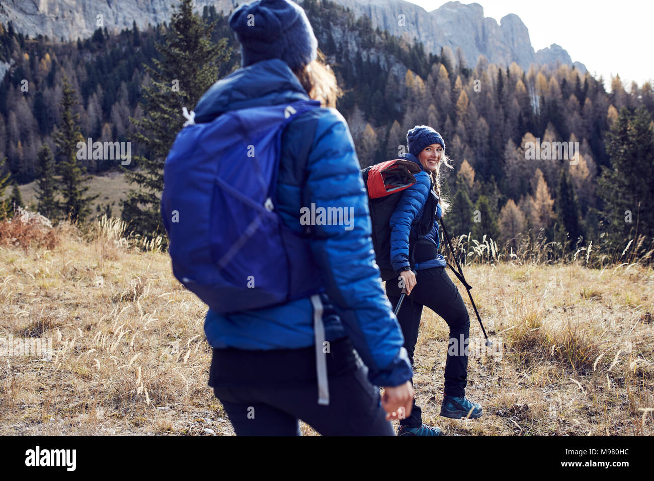Two young women hiking in the mountains Stock Photo