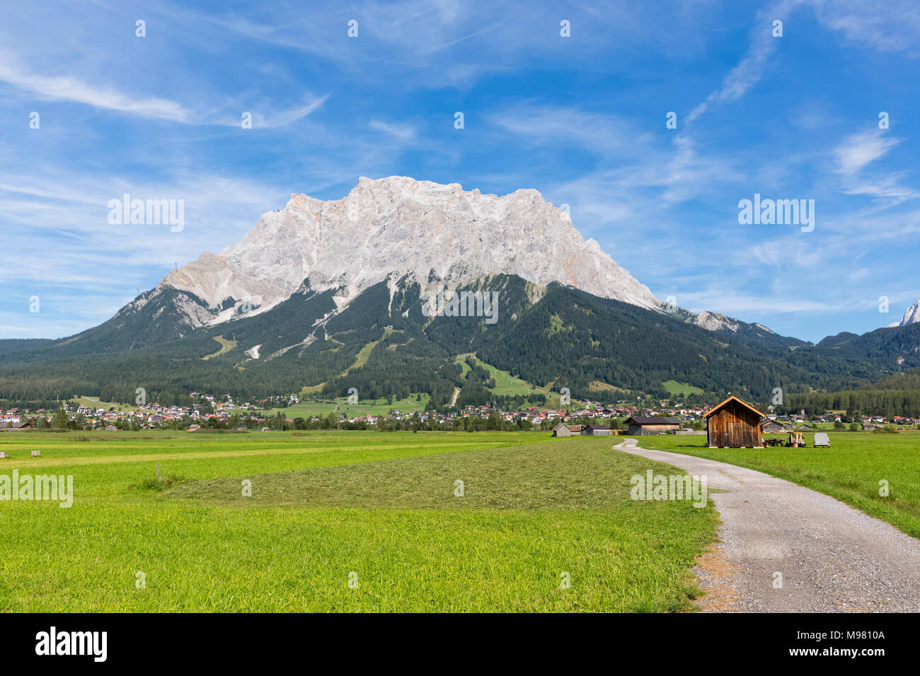 Austria, Tyrol, Lermoos, Ehrwalder Becken, View to Ehrwald and Zugspitze Stock Photo