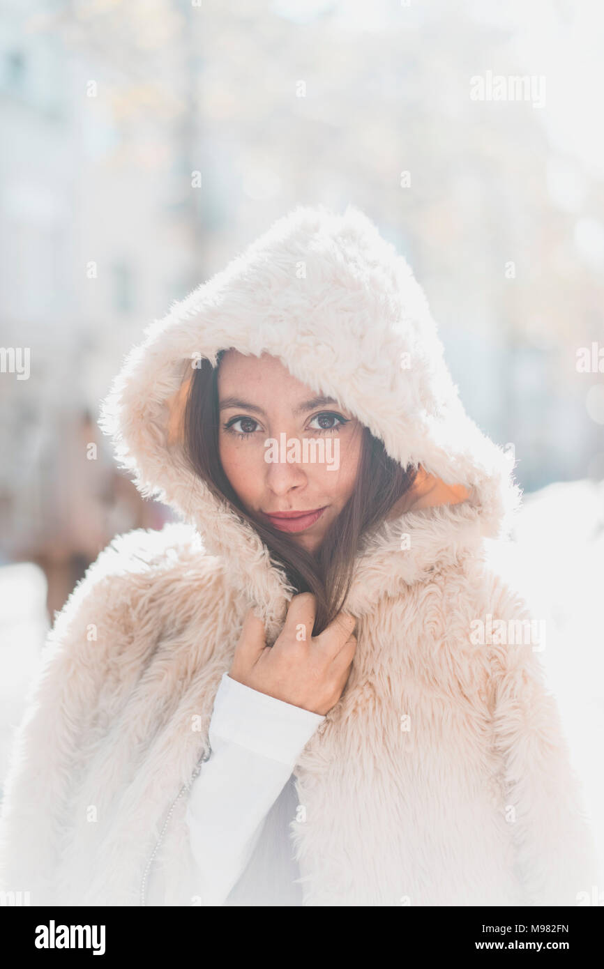 Woman wearing fur hood hi-res stock photography and images - Alamy