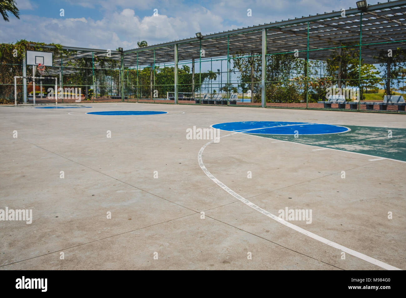 city outdoor basketball court - urban sports field - Stock Photo