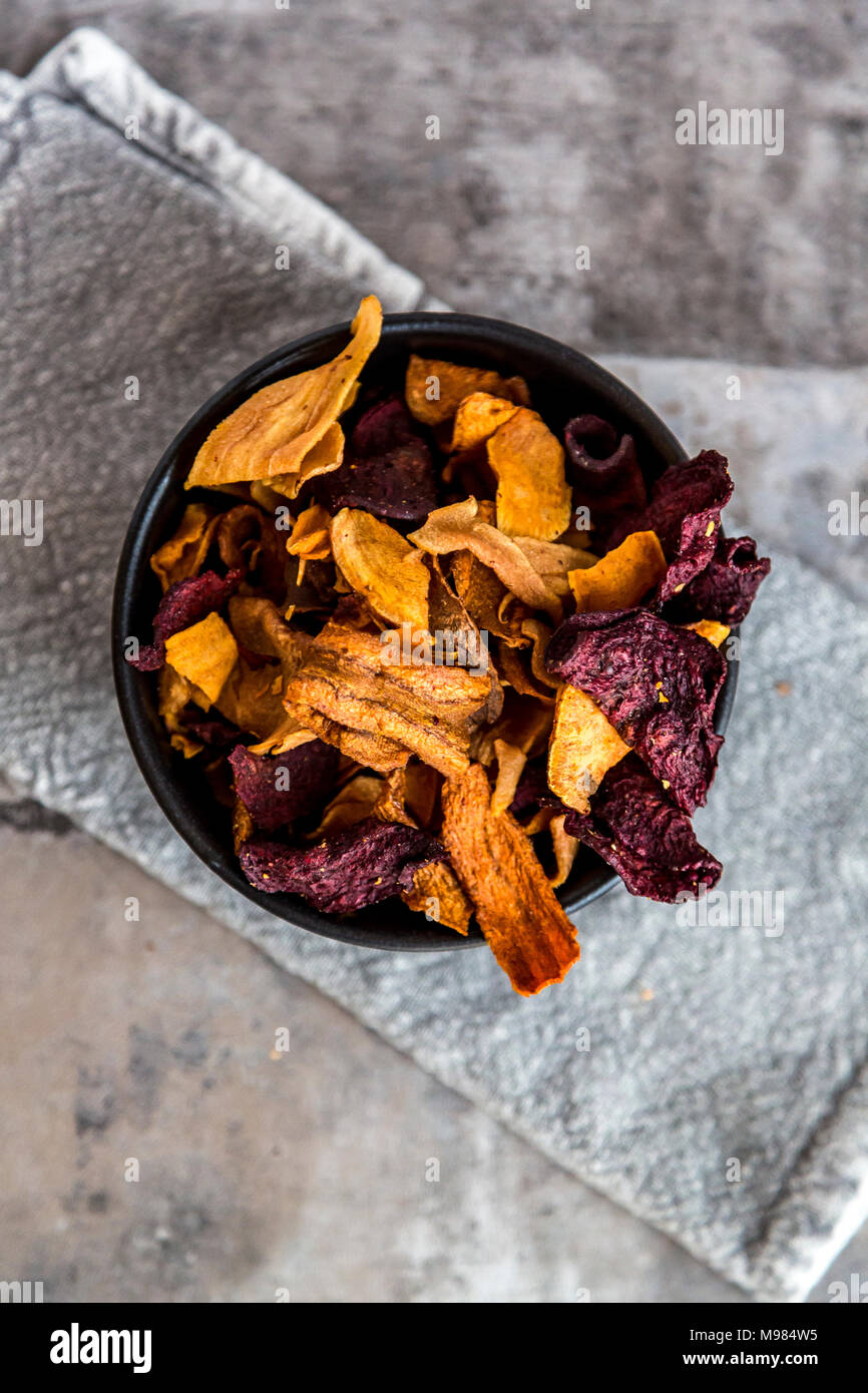 Roasted vegetable chips in bowl Stock Photo Alamy