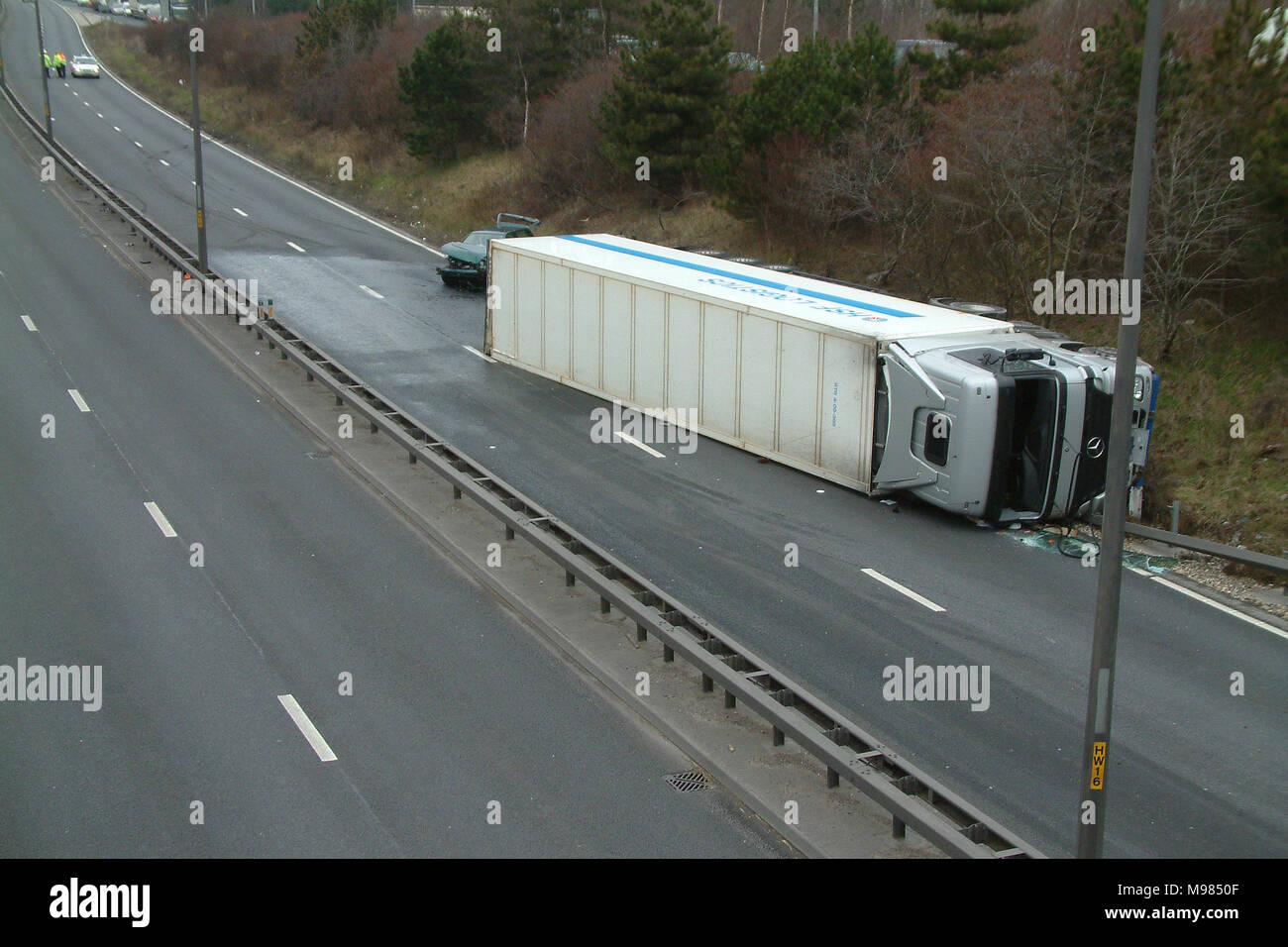 Lorry crash on motorway, lorry on its side, road traffic collision (RTC
