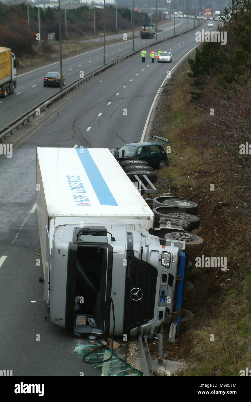 Lorry crash on motorway, lorry on its side, road traffic collision (RTC