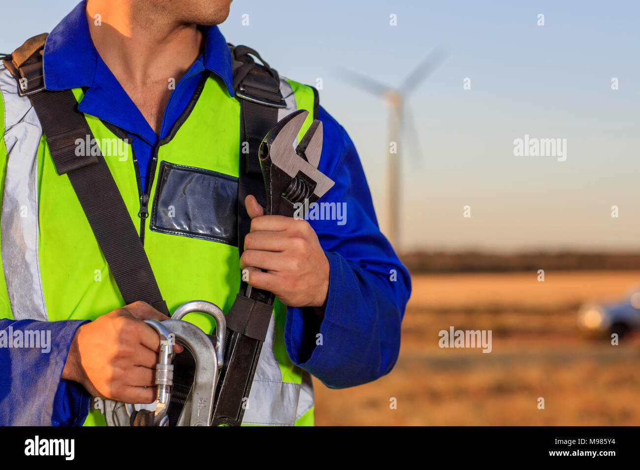Close-up of technician with equipment on a wind farm Stock Photo