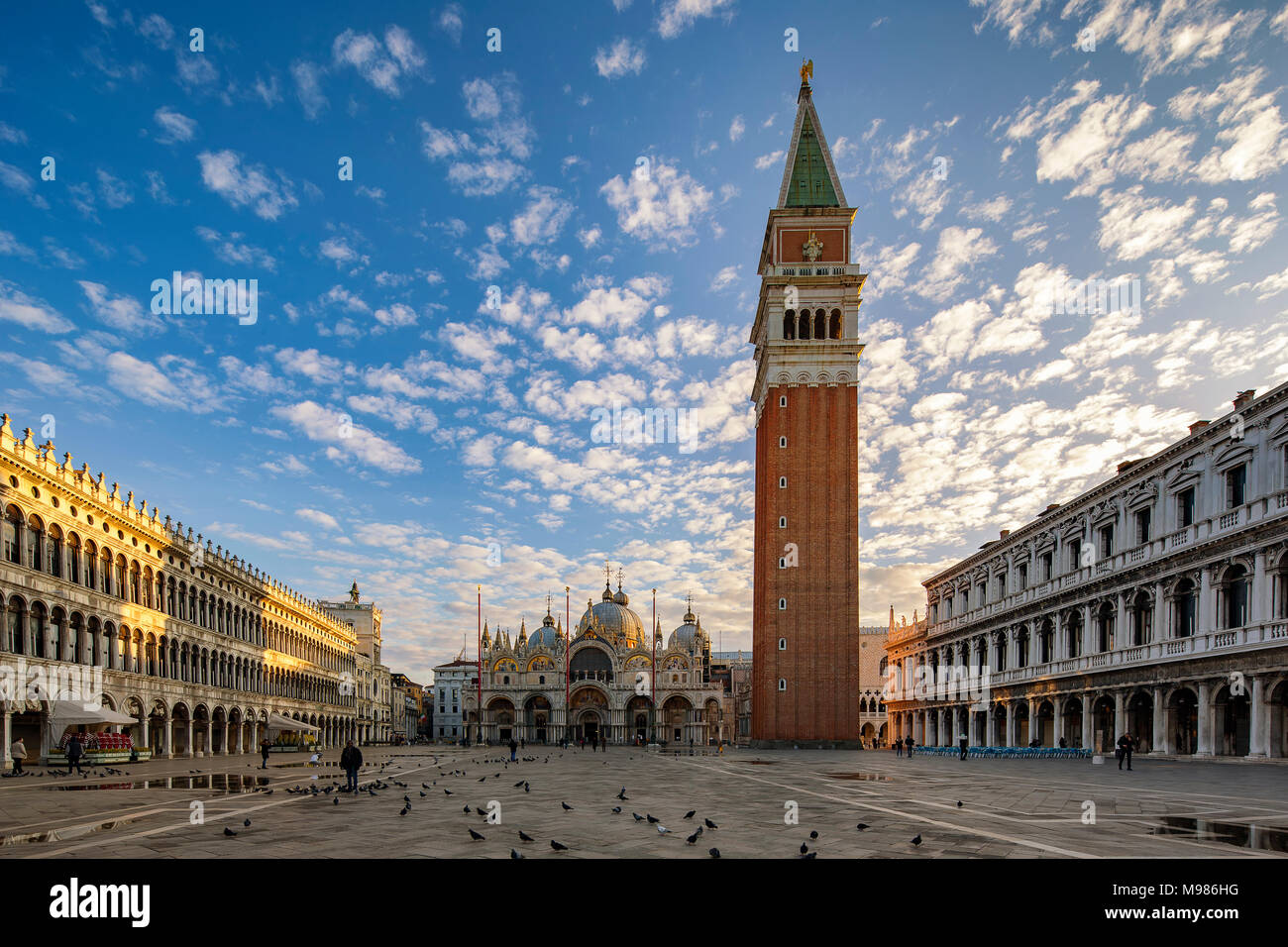 Italy, Veneto, Venice, St Mark's Square with St. Mark's Basilica and campanile, early morning Stock Photo