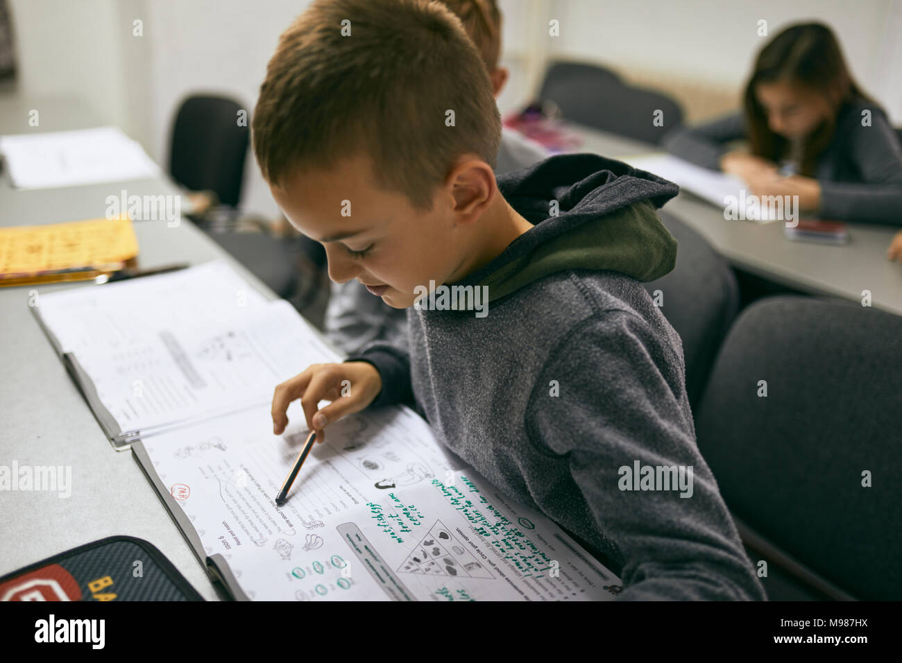 Students learning in class stock photo alamy