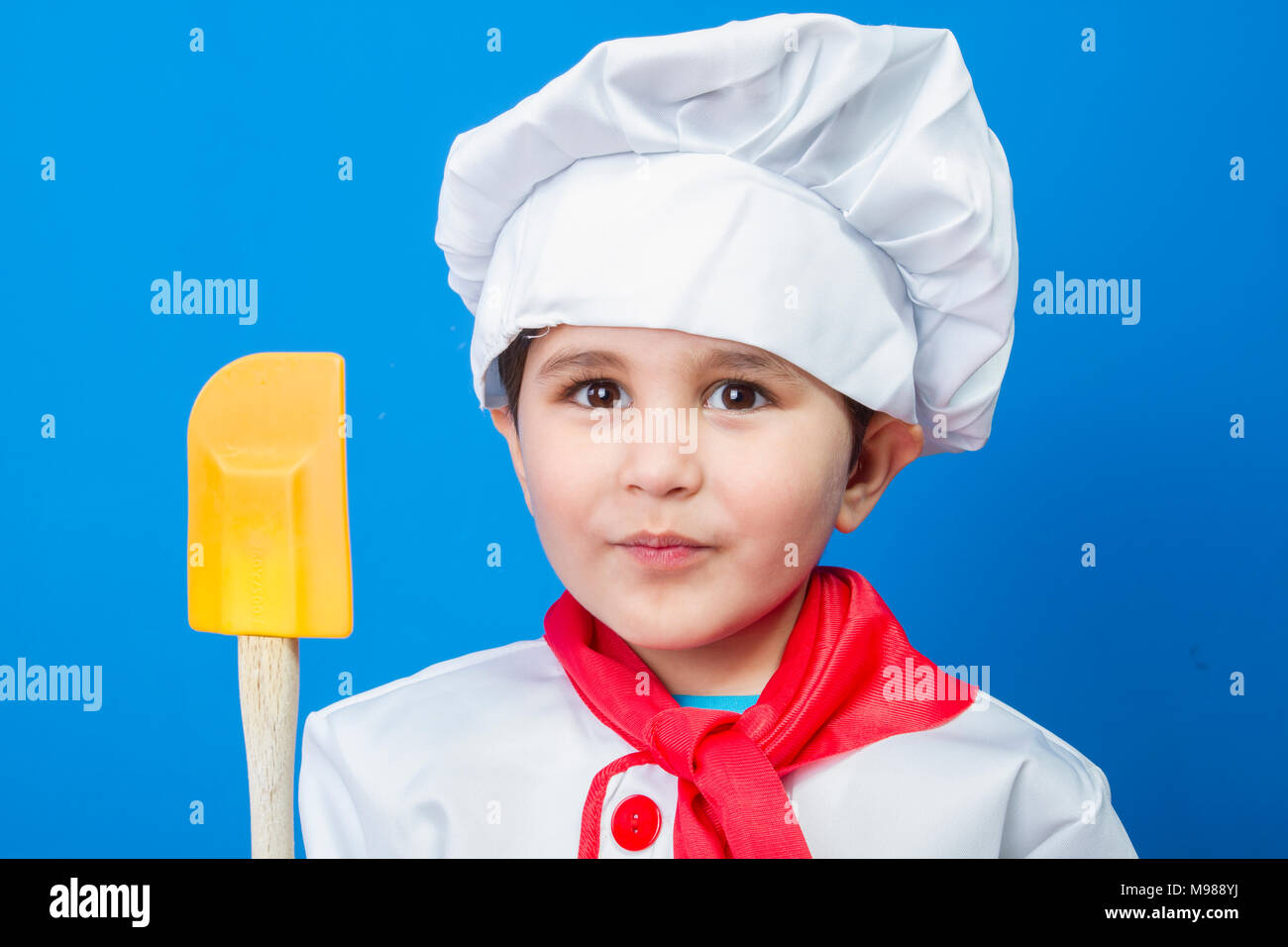 Cooking, The little boy in a suit of the cook. adorable little boy in