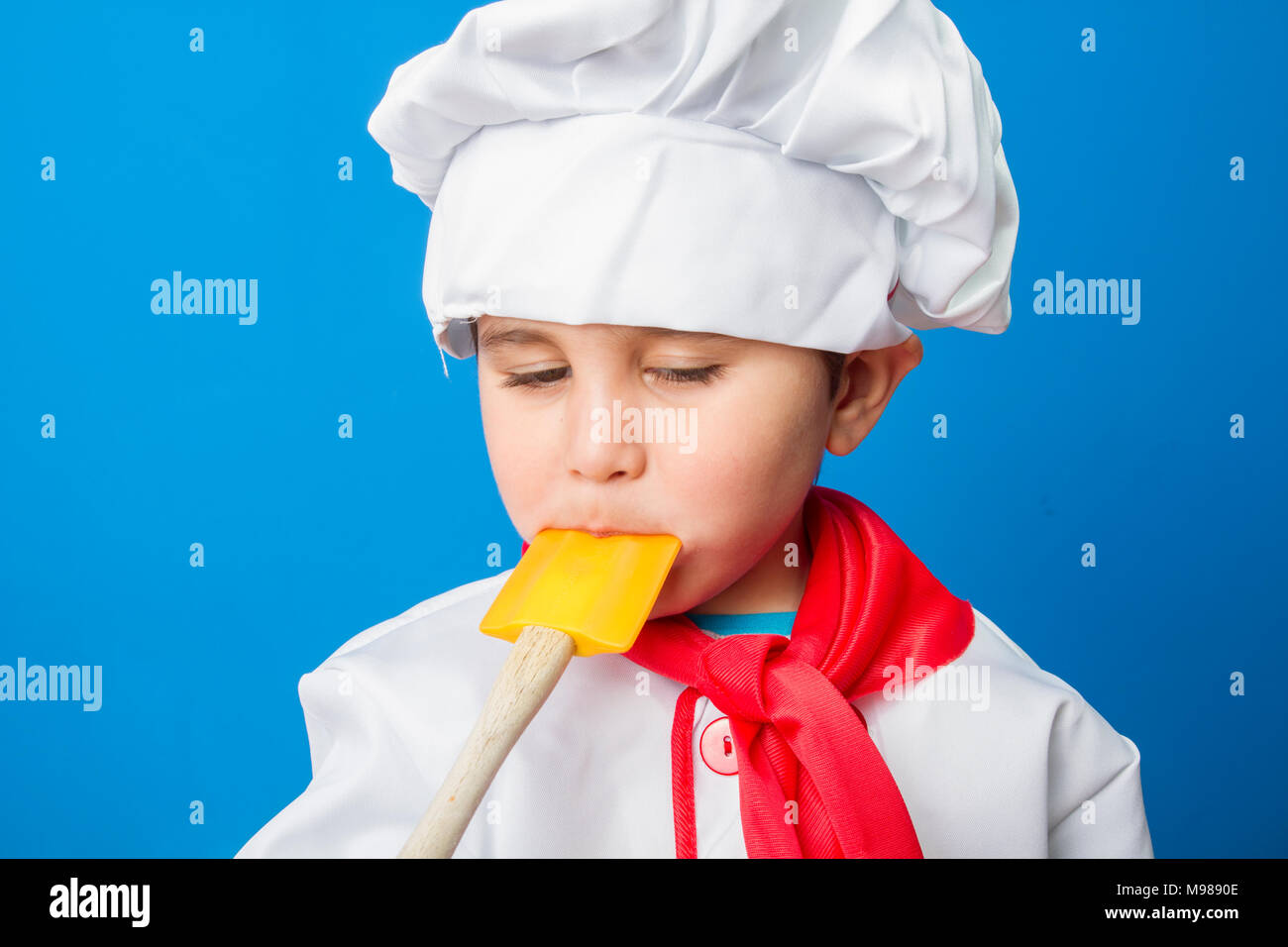 Cooking, The little boy in a suit of the cook. adorable little boy in