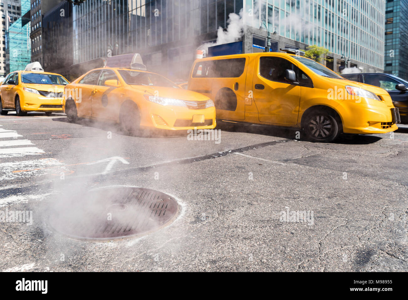 USA, New York, steam coming out from sewer Stock Photo