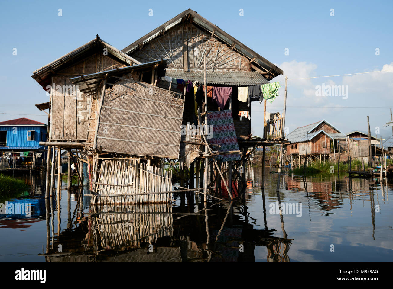 Floating house at sunset in Inle Lake, Myanmar. Stock Photo
