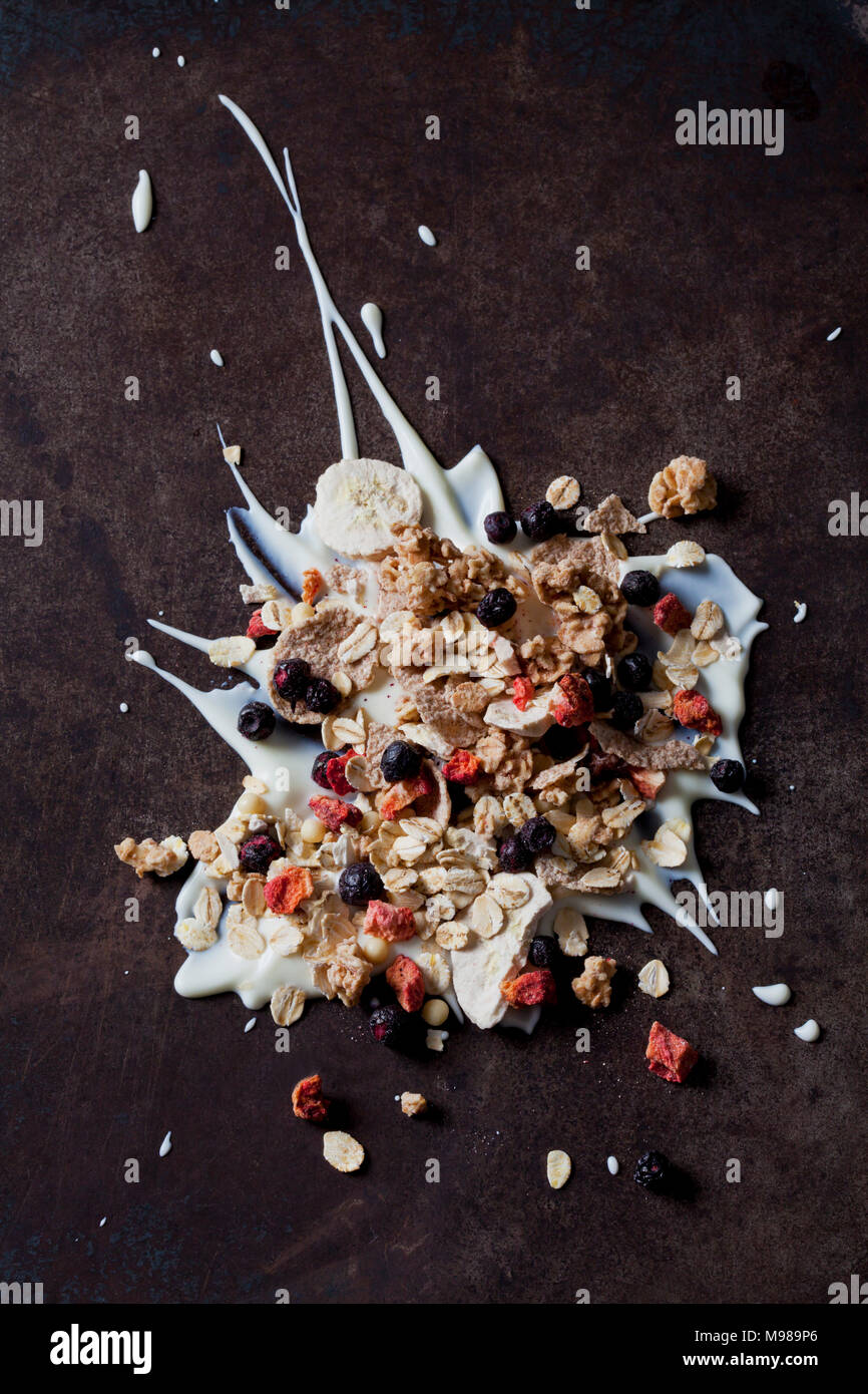 Fruit muesli with dried fruits on yoghurt splash Stock Photo Alamy