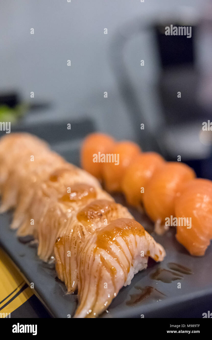 Set of Salmon aburi sushi with saikyo sauce on plate Stock Photo Alamy