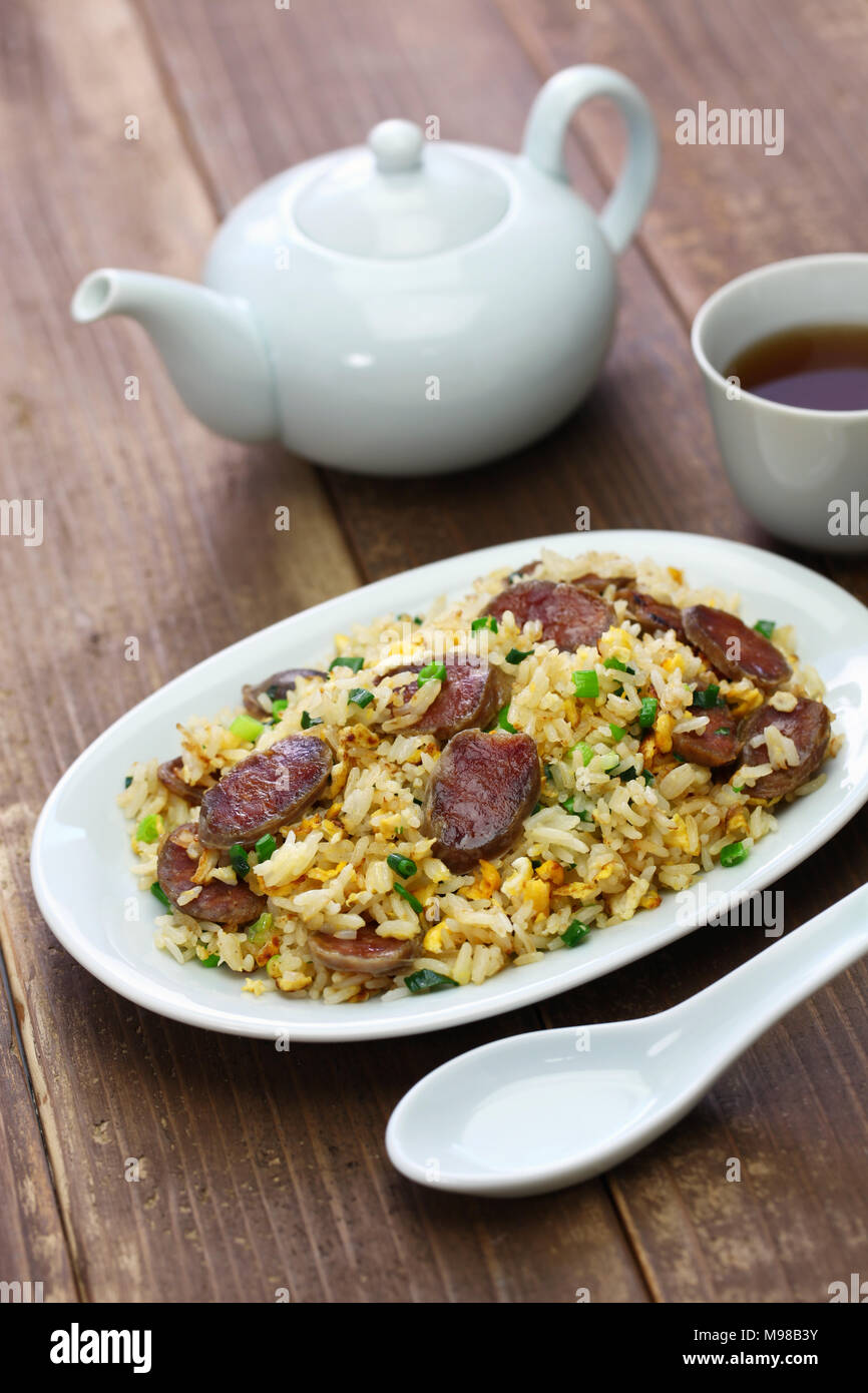 chinese sausage fried rice, xiang chang chao fan with oolong tea Stock Photo