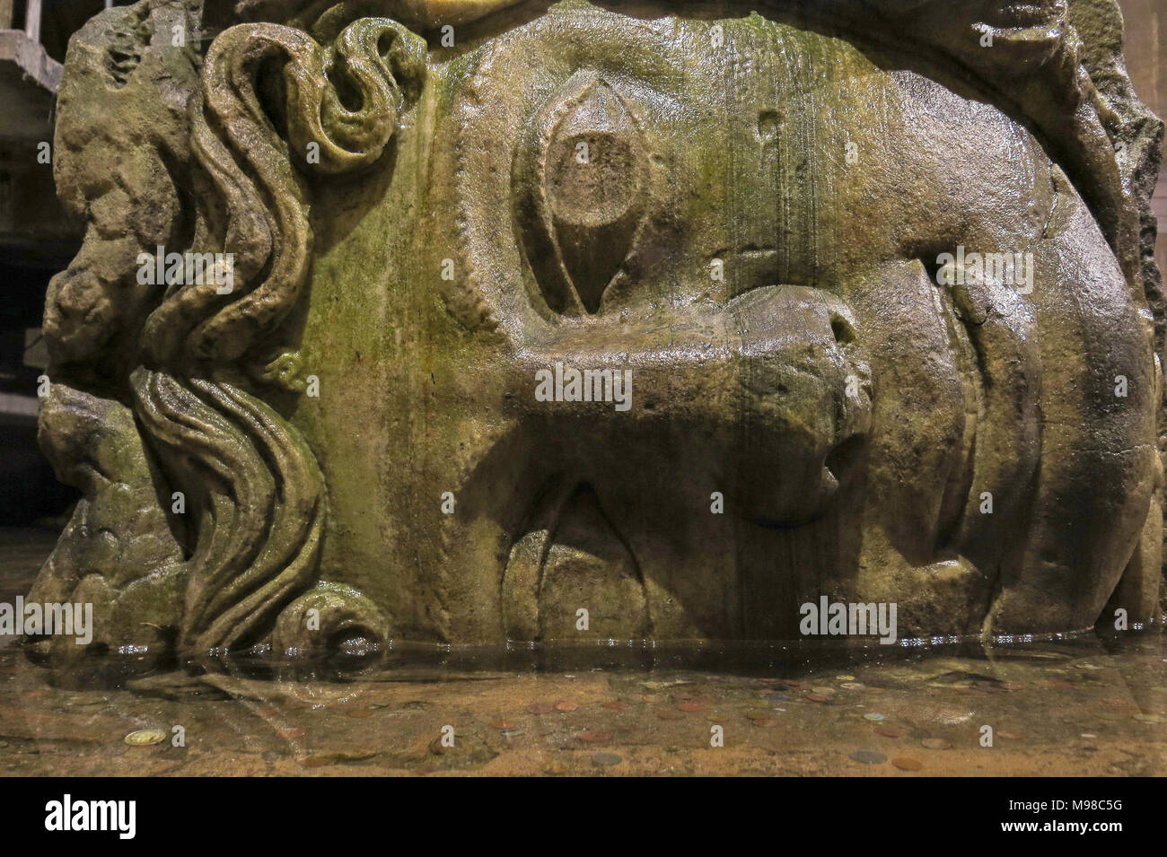 Medusa head in the Basilica Cisterna in Istanbul, Turkey. It is 143m long  and 65m wide underground water container, the one of most popular tourist  at Stock Photo - Alamy