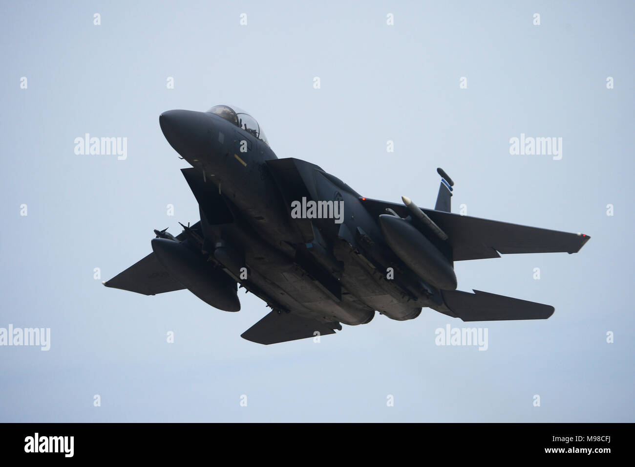 An F-15E Strike Eagle assigned to the 492nd Fighter Squadron, Royal Air Force Lakenheath, England flies over Andravida Air Base, Greece, March 21, 2018, during exercise INIOHOS 18. INIOHOS 18 is a Hellenic Air Force-led, large force flying exercise focused on strengthening partnerships and interoperability. (U.S. Air Force photo/1st Lt. Elias Small) Stock Photo
