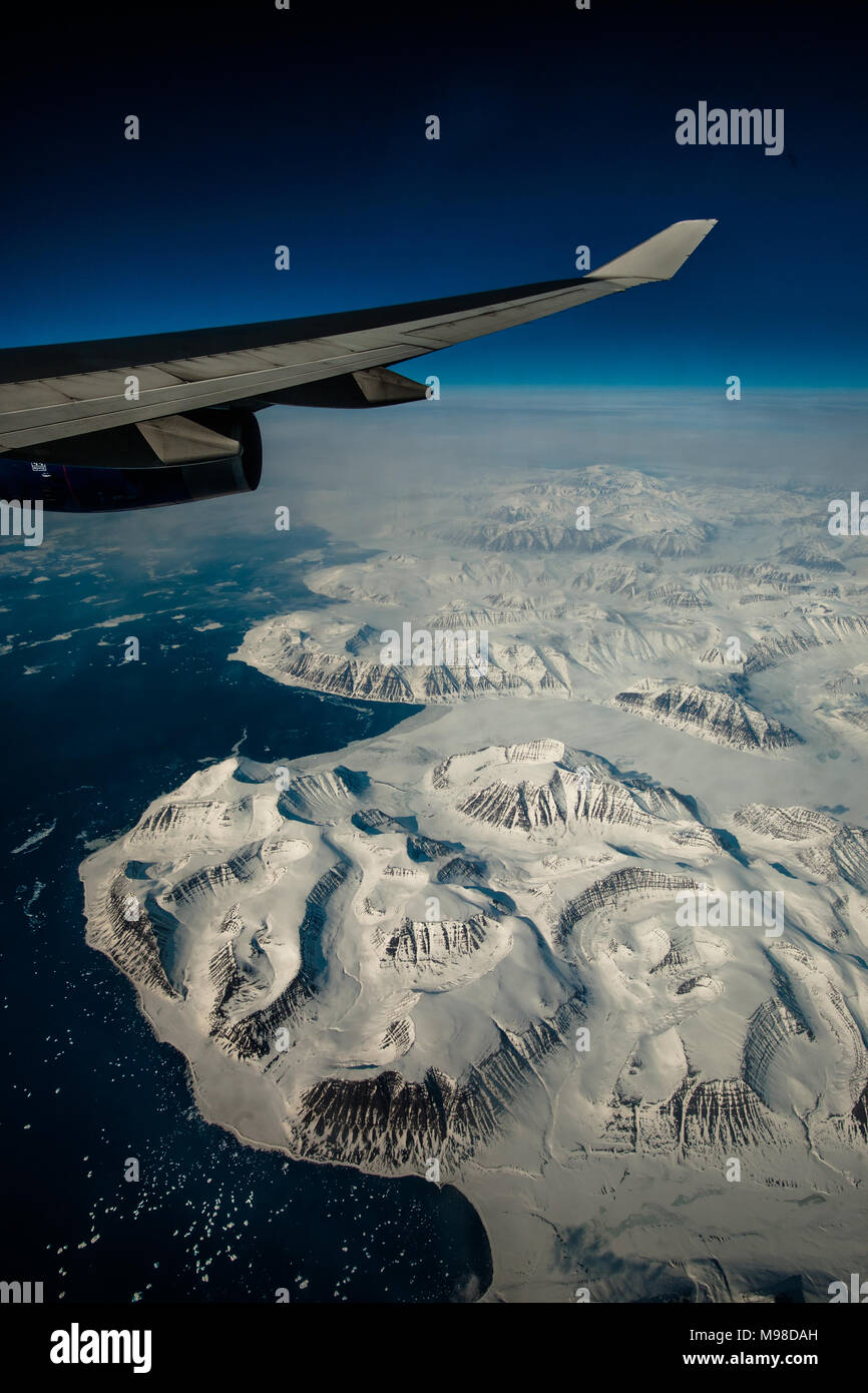 The wintery Icelandic coast from high altitude flying to USA Stock Photo