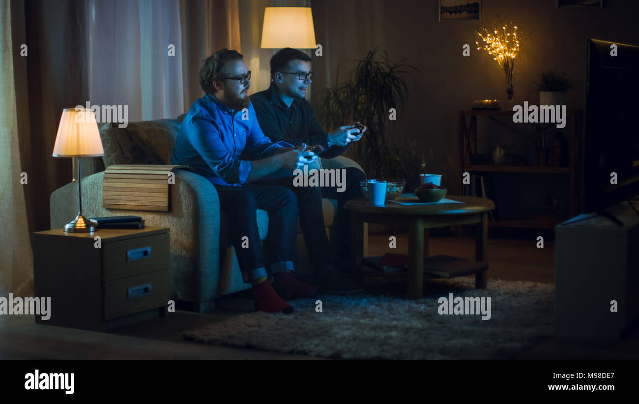 Men Relax By Playing Competitive Video Games As Friends In A Local Internet  Bar That Specializes In Online Gaming Stock Photo, Picture and Royalty Free  Image. Image 81203430.