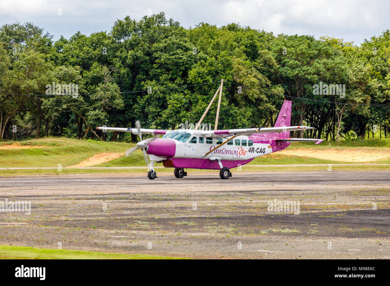 Cinnamon Air Cessna 208B Grand Caravan, a small light passenger aircraft taxiing on the runway at domestic Sirigiya Airport, Sri Lanka Stock Photo