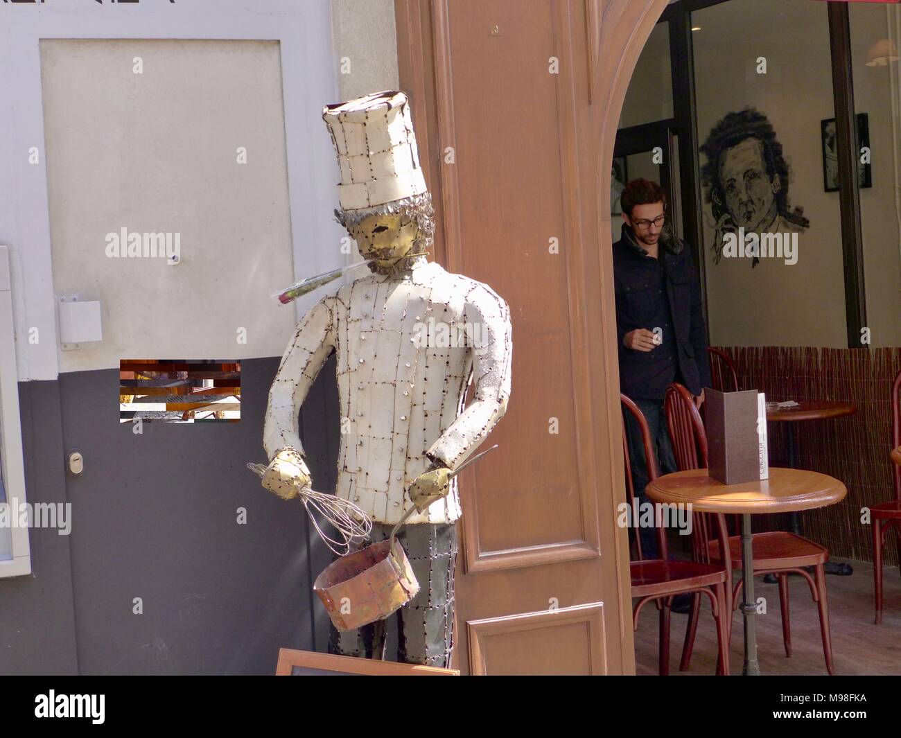 Tin statues outside a restaurant in Montmartre, Paris Stock Photo