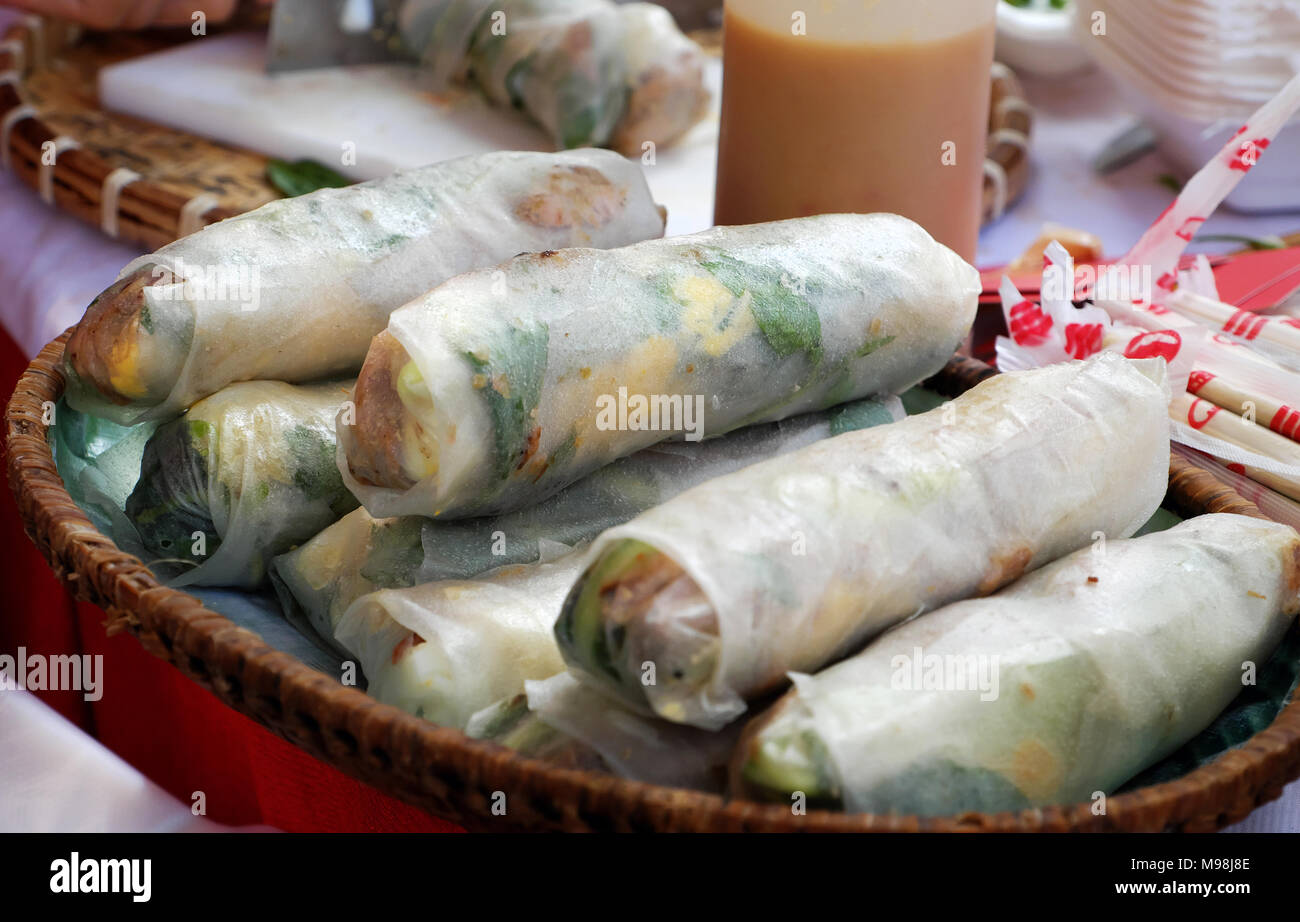 Vietnamese street food, rice paper rolls, famous snack of Binh Dinh at cuisine fair, Ho Chi Minh city, Vietnam, roll make with ingredient  as meat, eg Stock Photo