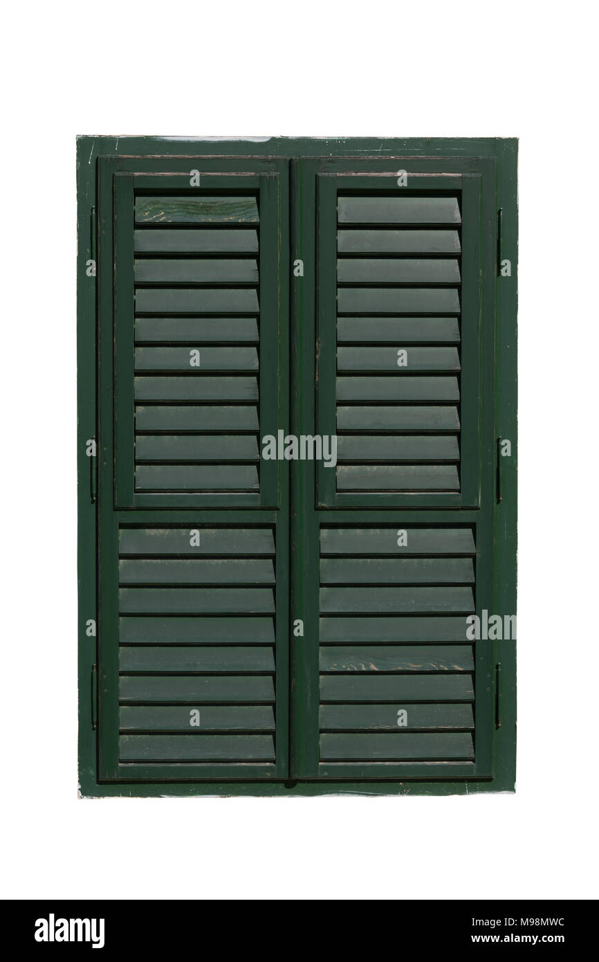 Closed old window with green wooden shutters isolated on white ...