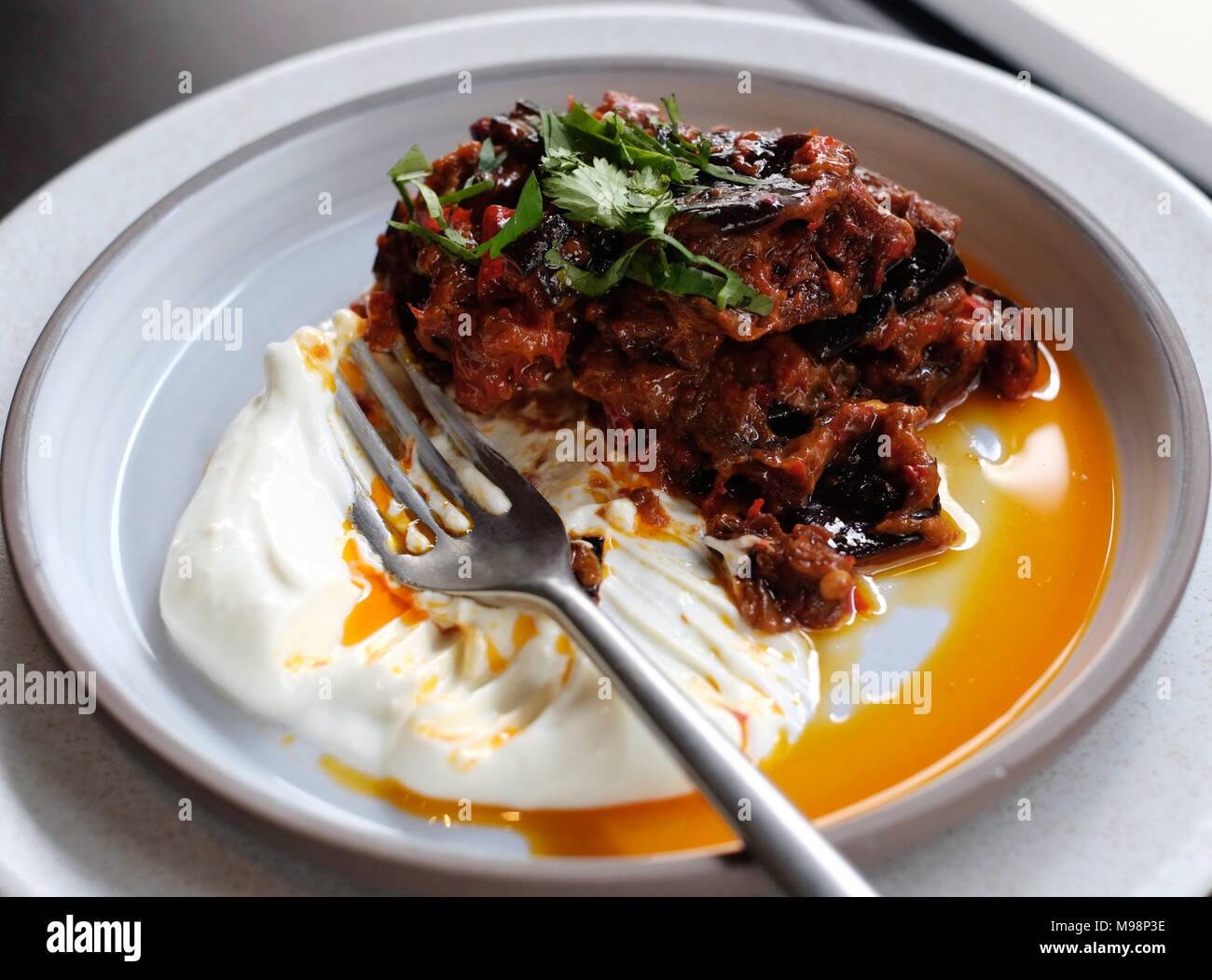 Eggplant samba with bergamot labneh at Scully Restaurant, St James's, London Stock Photo