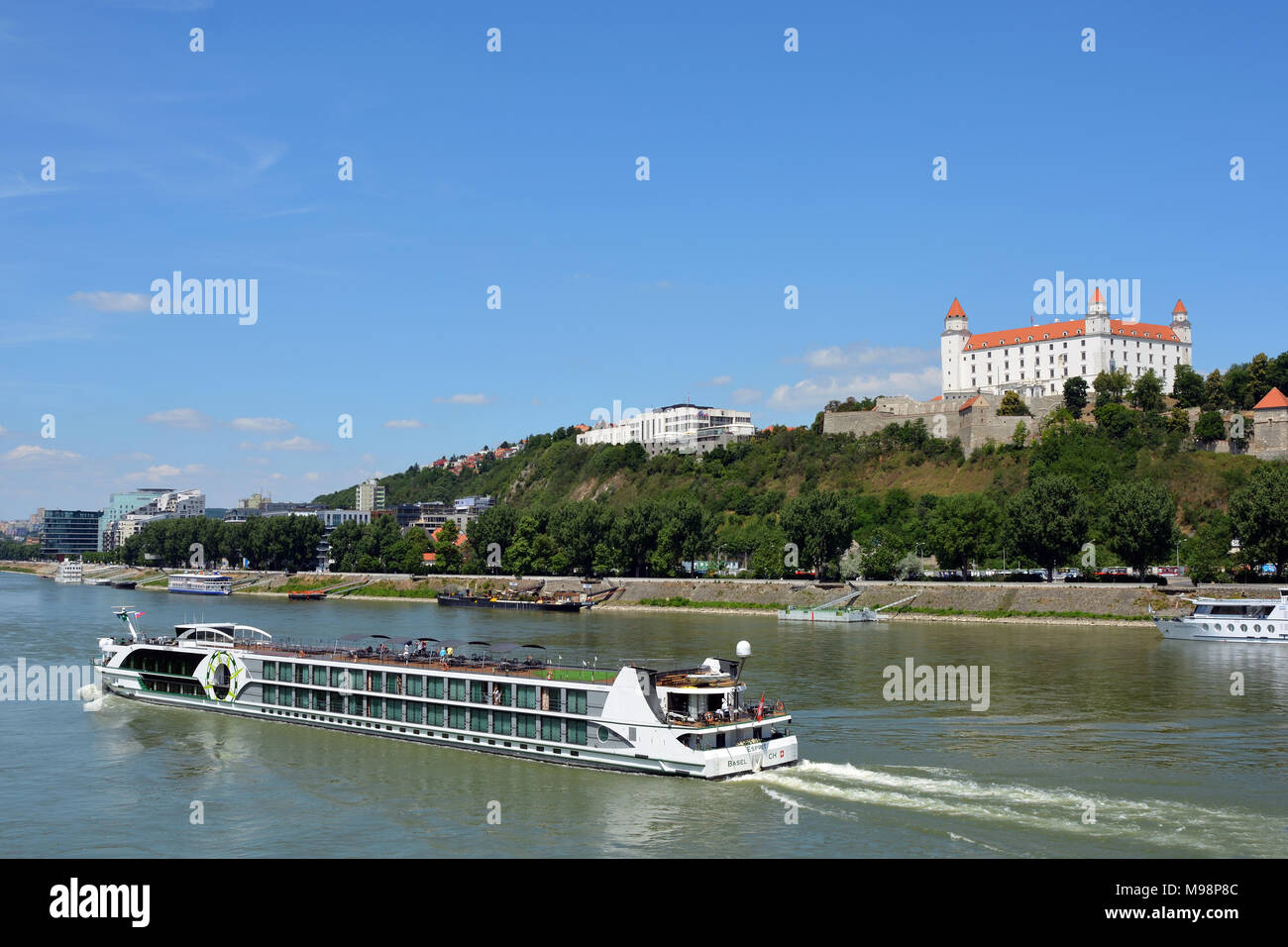 Bratislava, Slovakia - June 14, 2017: Passenger ship on the Danube in front of the castle castle in the Slovak capital Bratislava - Slovakia. Stock Photo