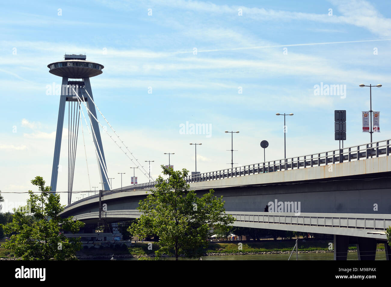 Bratislava, Slovakia - June 14, 2017: Bridge of the Slovak National Uprising SNP over the river Danube in Bratislava - Slovakia. Stock Photo