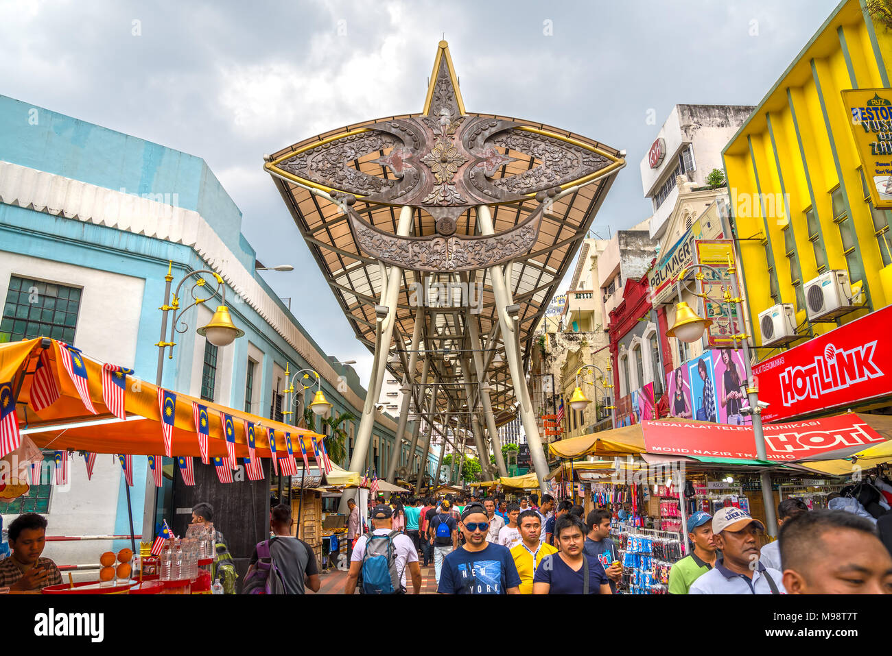 KUALA LUMPUR, MALAYSIA - FEBRUARY 19, 2018: People walking and shopping around Kasturi Walk Central Market in Kuala Lumpur Stock Photo