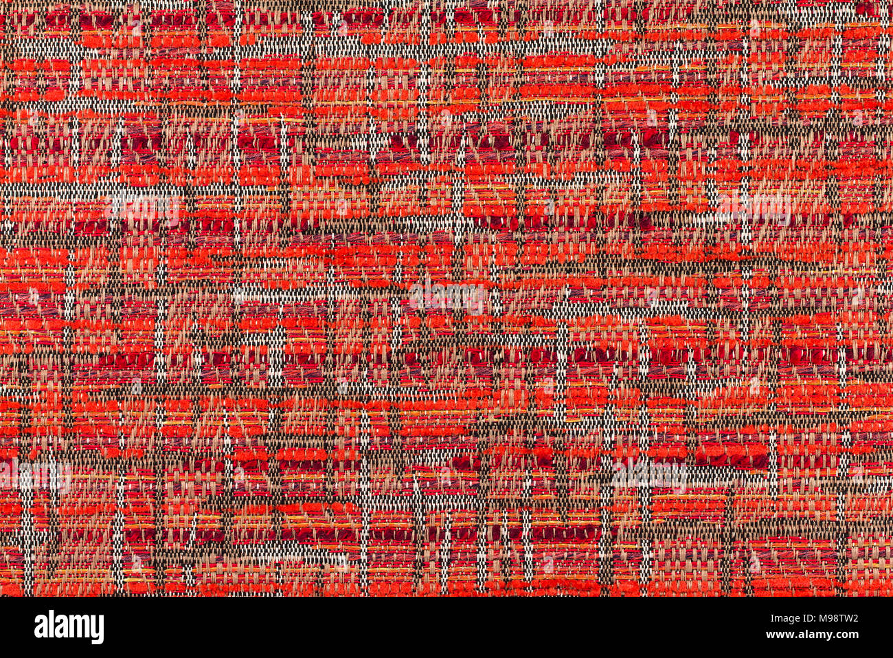 Red background with an abstract pattern. Close-up. Stock Photo