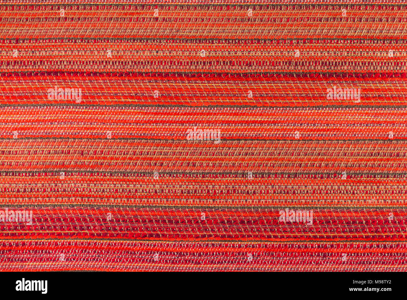 Red background with an abstract pattern. Close-up. Stock Photo