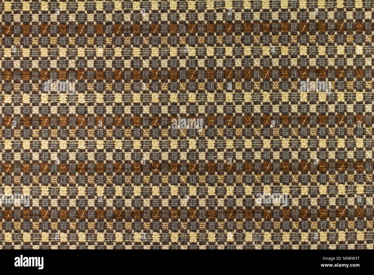 Light brown background with an abstract pattern. Close-up. Stock Photo