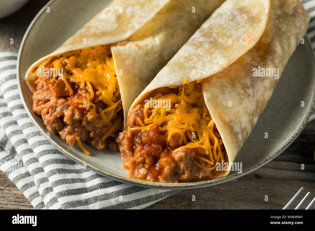 Homemade Bean and Cheese Burrito in a Tortilla Stock Photo Alamy