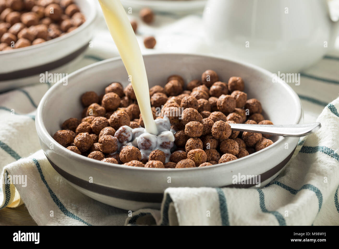 Sweet Cocoa Chocolate Sugar Cereal Puffs with Milk Stock Photo Alamy