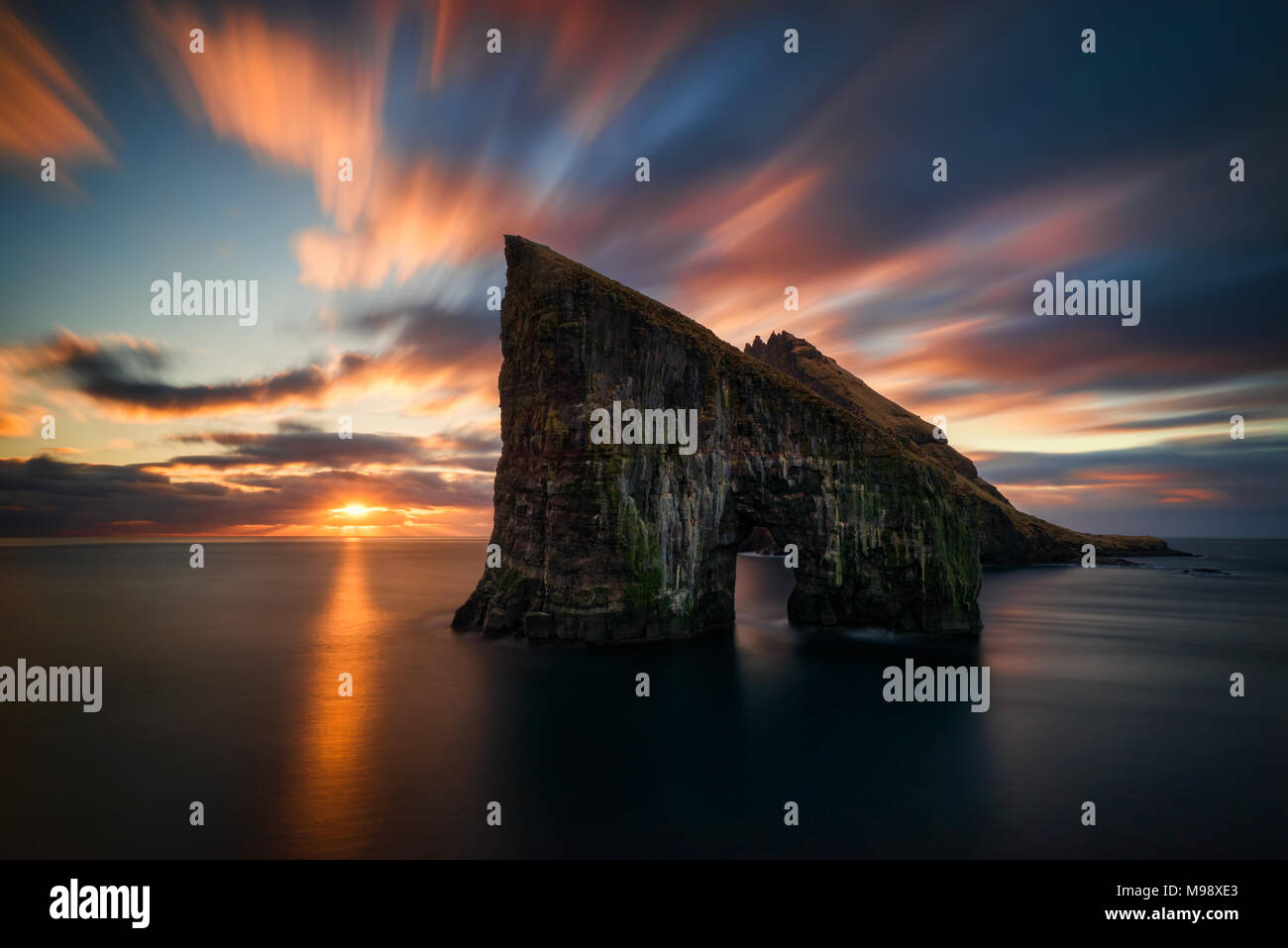 Drangarnir rocky arch on Vagar island in sunset, Faroe Islands Stock ...