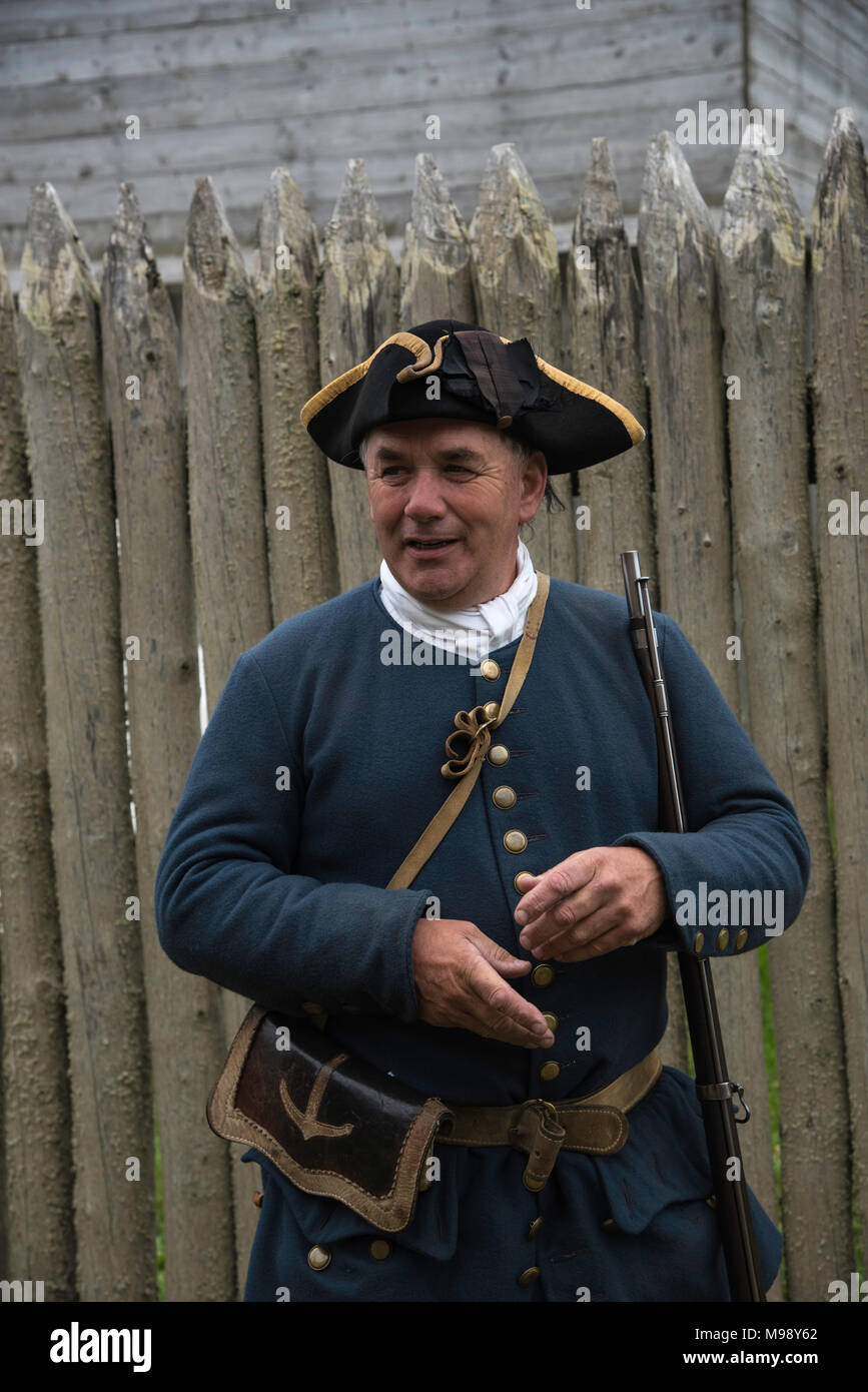 LOUISBOURG, NOVA SCOTIA CANADA - CIRCA SEPTEMBER 2016 - Authentic costumed resident of Fortress of Louisbourg National Historic Site. Stock Photo