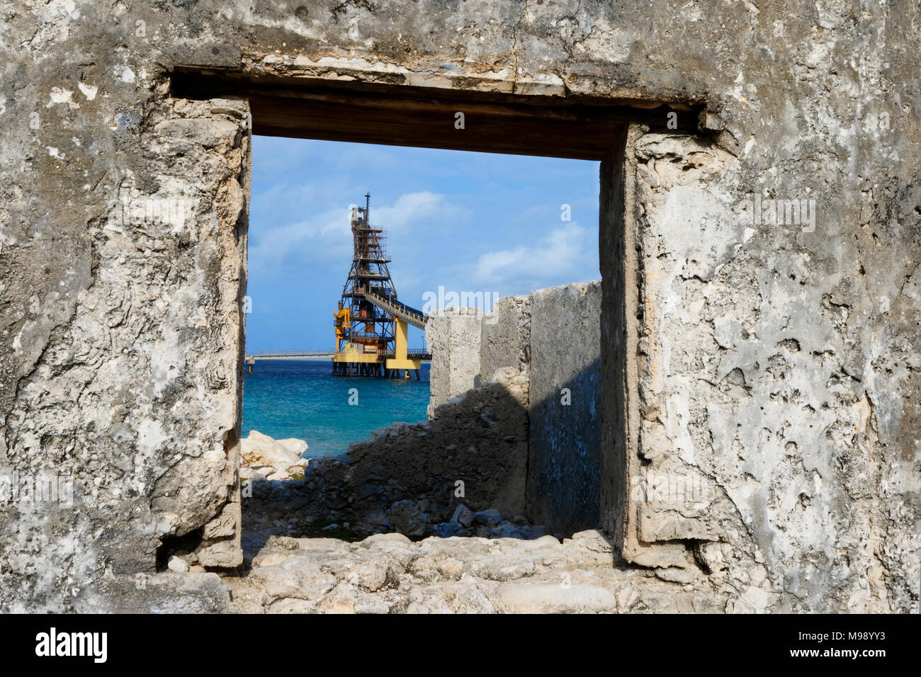 Salt Pier viewed through the window of an abandoned building - Bonaire, Netherlands Antilles Stock Photo