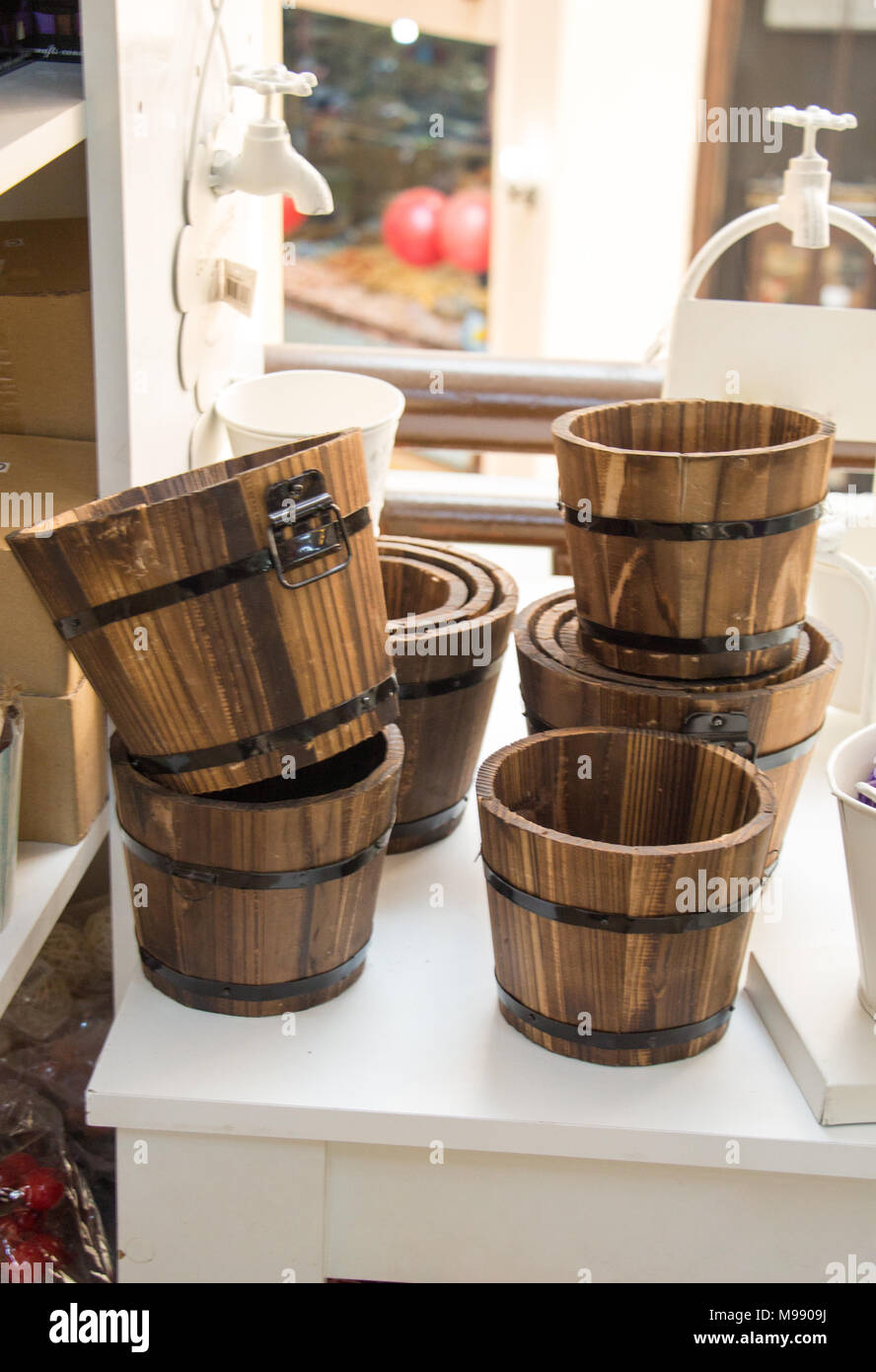 Set of buckets made of wood in a market place Stock Photo Alamy