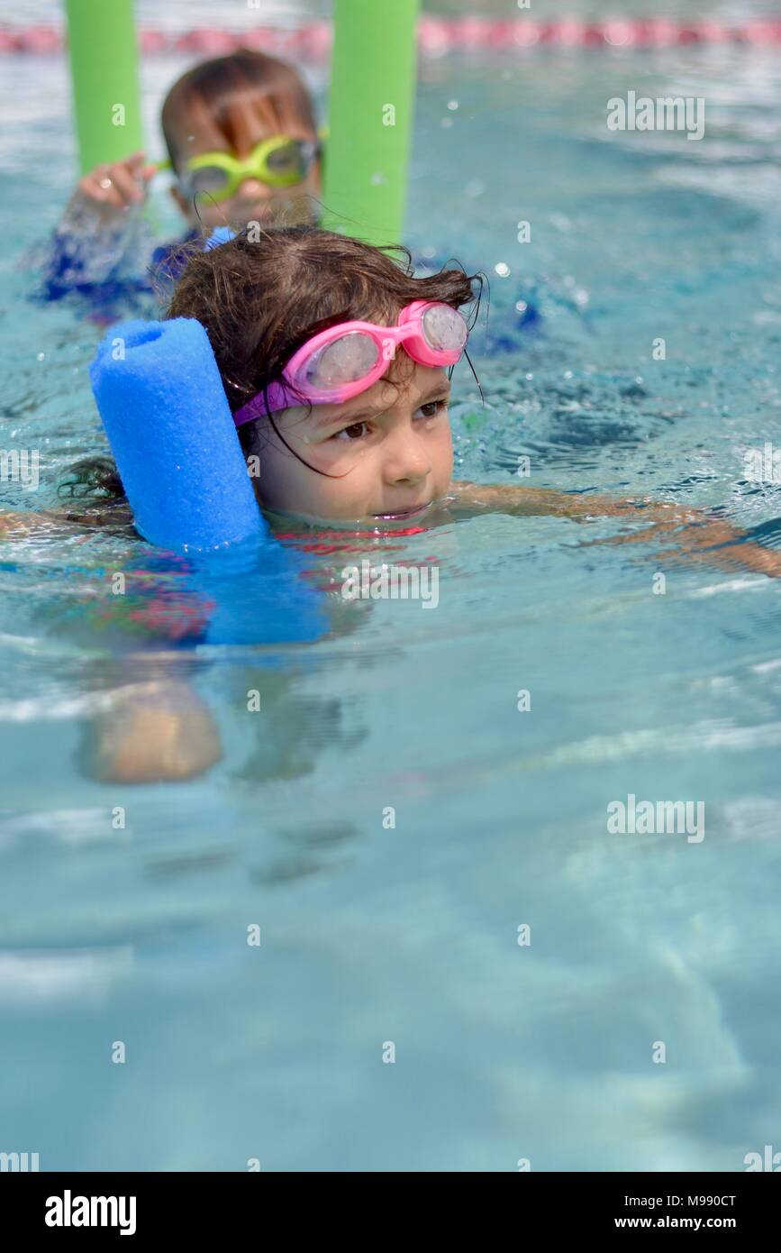 Mother teaches children how to swim, Kokoda swimming pool, Townsville