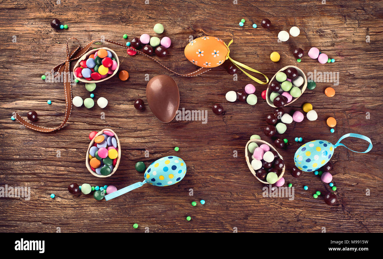 Easter eggs on rustic wooden background. Top view Stock Photo