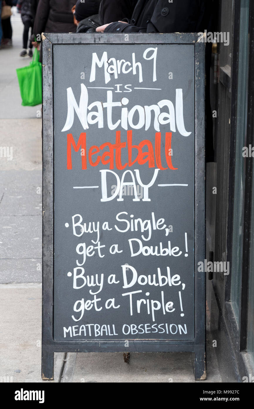 A sign outside the Meatball Obsession takeout stand offering special deals on March 9, National Meatball Day. In Manhattan, New York City. Stock Photo